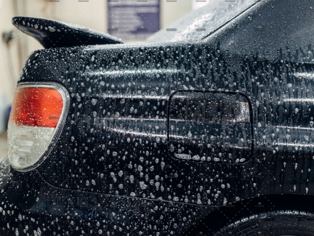 demo-attachment-996-op_carwash-service-car-in-foam-side-view-Q4VTD8M